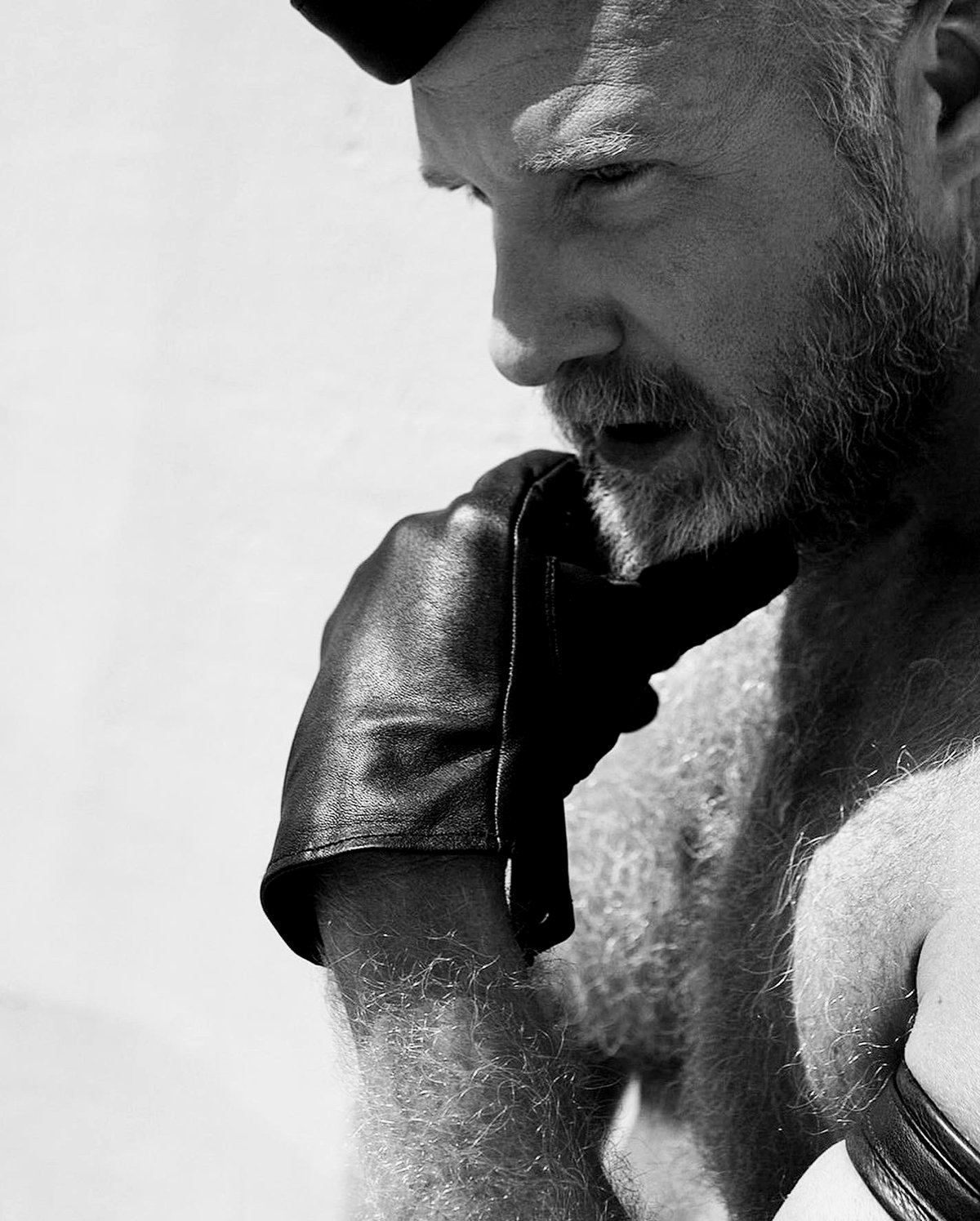 Court Vox — portrait in leather cap and glove